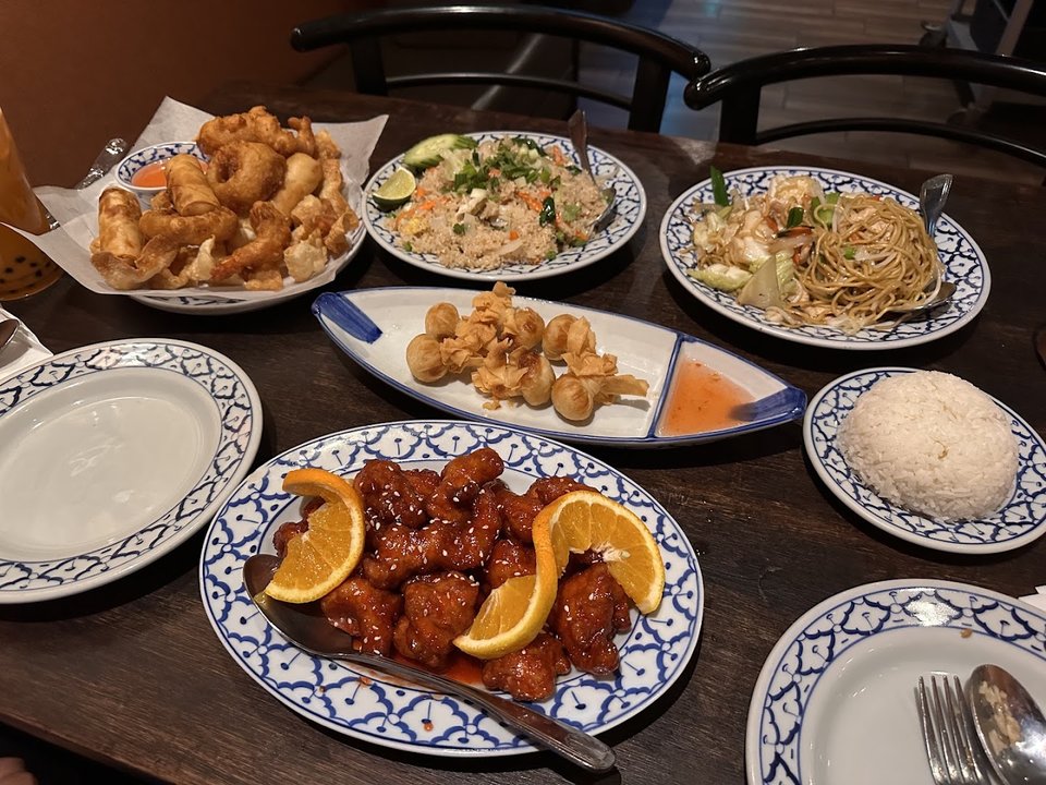 Simple strip-mall dining room with table service.